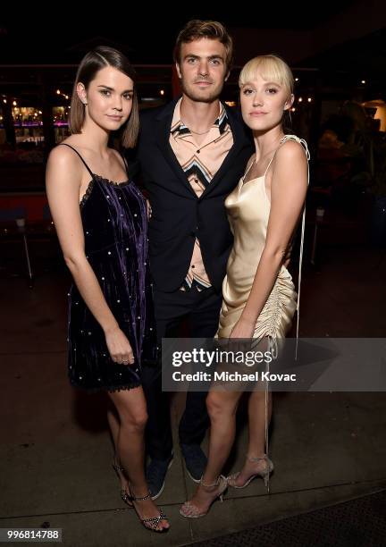 Actors Maia Mitchell, Alex Roe, and Maika Monroe attend the after party for the Los Angeles Special Screening of "Hot Summer Nights" on July 11, 2018...