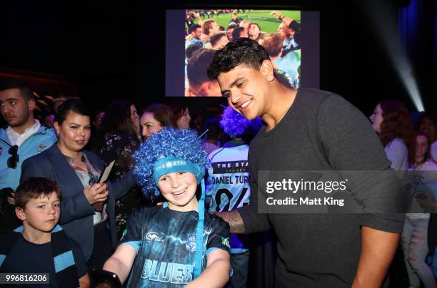 Latrell Mitchell interacts with fans during a New South Wales Blues public reception after winning the 2018 State of Origin series at The Star on...