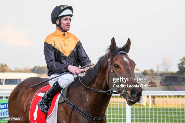 Rox The Castle ridden by Luke Nolen returns after winning the Gippsland Funeral Services BM64 Handicap at Sale Racecourse on July 12, 2018 in Sale,...