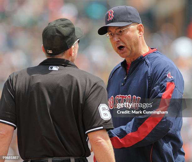 Manager Terry Francona of the Boston Red Sox argues his point with home plate umpire Lance Barksdale during the game against the Detroit Tigers at...