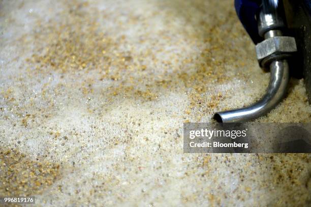 Barley soaks in a fermentation vat at the Lark Distillery Ltd. Whisky and gin distillery in Cambridge, Tasmania, Australia, on Tuesday, July 3, 2018....