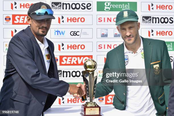 Suranga Lakmal Sri Lankan captain and Fuf Du Plessis South African captain unveiling the Test series trophy before day 1 of the 1st Test match...