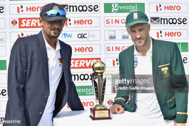 Suranga Lakmal Sri Lankan captain and Fuf Du Plessis South African captain unveiling the Test series trophy before day 1 of the 1st Test match...