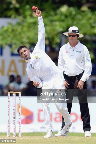 South Africa cricketer Keshav Maharaj delivers the ball during day 1 of the 1st Test match between Sri Lanka and South Africa at Galle International...