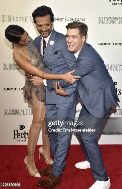 Janina Gavankar, Utkarsh Ambudkar, and Rafael Casal attend the premiere of Summit Entertainment's "Blindspotting" at The Grand Lake Theater on July...