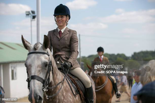 Participant seen riding a horse during the Great Yorkshire Show 2018 on day one. The Great Yorkshire Show is the biggest 3 days agricultural event in...