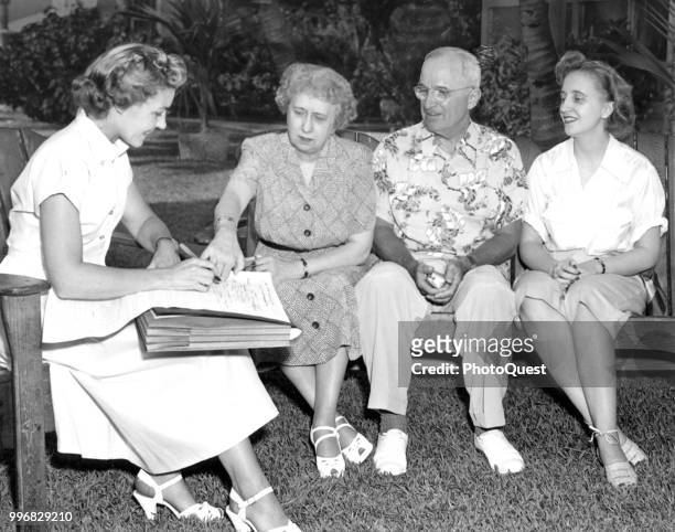 Census enumerator Eileen Nolte , records answers as she speaks with married couple US First Lady Bess and President Harry S Truman , and their...