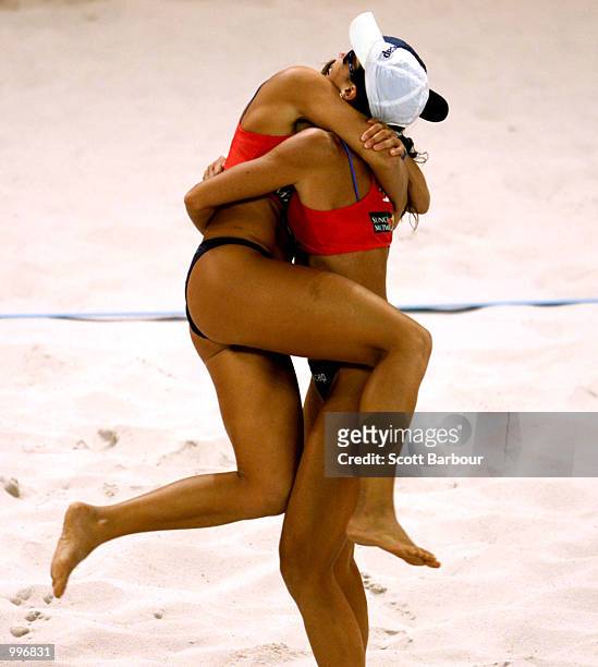 Sandra Pires and Tatiana Minello of Brazil celebrate after the Cook/Pottharst of Australia v Sandra Pires/Minello of Brazil Beach Volleyball match...