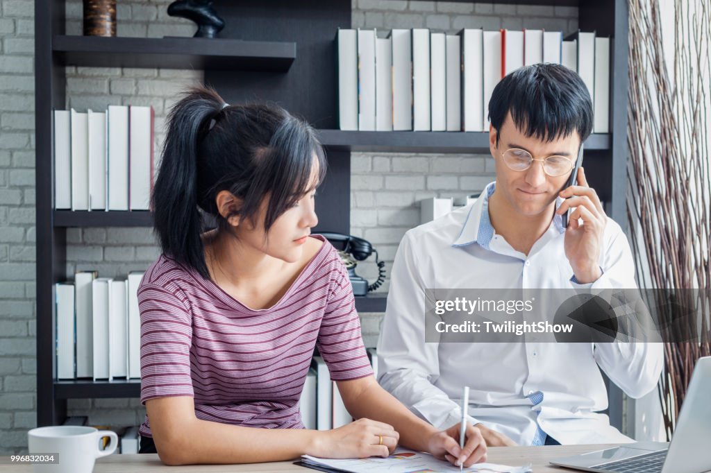 Business couple working on computer