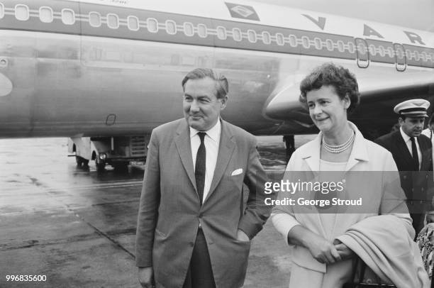 English Labour Party politician and Chancellor of the Exchequer, James Callaghan pictured with his wife Audrey Callaghan at Heathrow airport in...