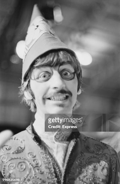 Ringo Starr, drummer with the Beatles, pictured wearing a pointed hat and face make up during the final day of filming of 'Magical Mystery Tour' at...