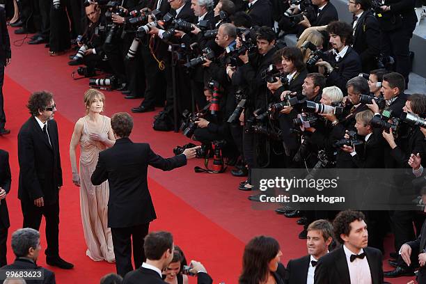 Isabelle Huppert and Tim Burton attend "Biutiful" Premiere at the Palais des Festivals during the 63rd Annual Cannes Film Festival on May 17, 2010 in...