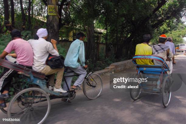 indian rickshaw rider mode of transport - mode imagens e fotografias de stock