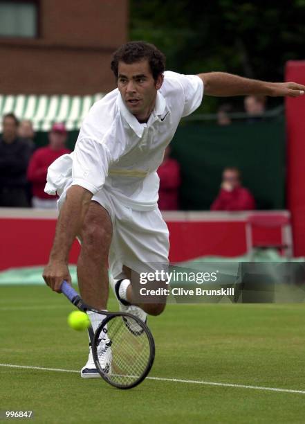 Pete Sampras of the USA in action against Lleyton Hewitt of Australia during the semi-finals of the Stella Artois Championships at Queen's Club,...