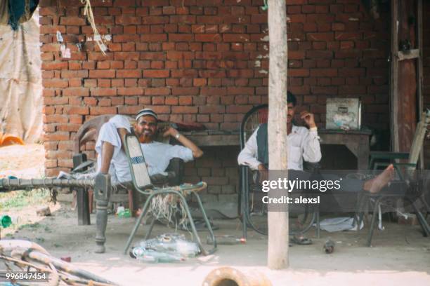 indian traditional street shop market in rural area - alexsl stock pictures, royalty-free photos & images