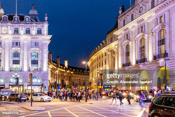 piccadilly circus and regent street at night, london, uk - town square night stock pictures, royalty-free photos & images