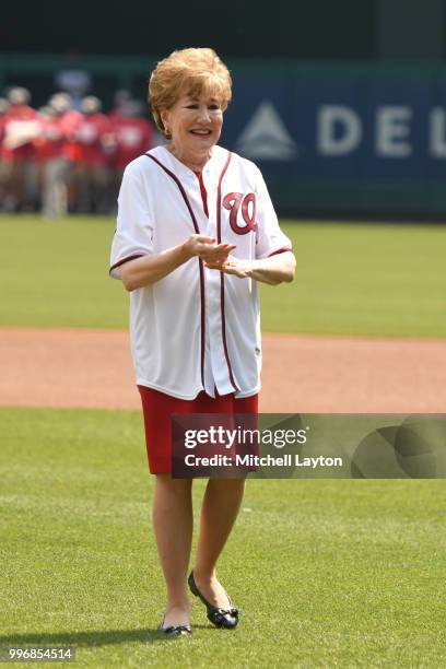 Senator Elizabeth Dole on the field before a baseball game between the Washington Nationals and the Boston Red Sox at Nationals Park on July 4, 2018...