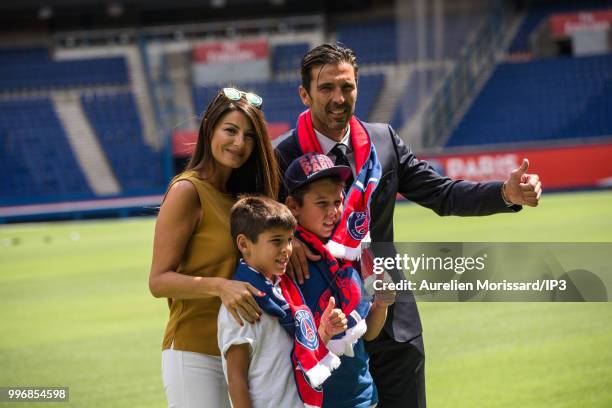 The former Juventus and Italian goalkeeper Gianluigi Buffon and his family attend the press conference announcing his arrival at the Paris Saint...