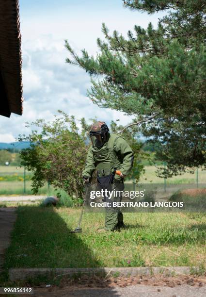 French army legionnaire attend a mine-clearing and bomb disposal exercice in Saint-Christol, southern France, on June 12, 2018.