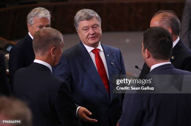 Ukrainian President Petro Poroshenko arrives for a working session of NATO leaders and the delegations from Ukraine and Georgia at the 2018 NATO...