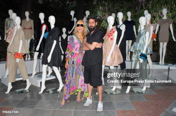 Designer Moises Nieto and Carmen Lomana pose during Mercedes Benz Fashion Week Madrid Spring/ Summer 2019 at IFEMA on July 11, 2018 in Madrid, Spain.