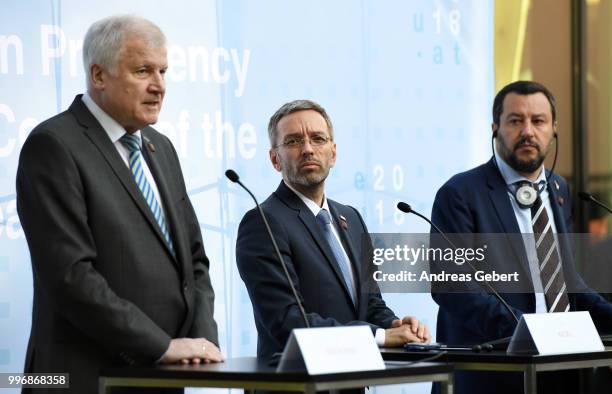 German Interior Minister Horst Seehofer, Austrian Interior Minister Herbert Kickl and Italian Interior Minister Matteo Salvini speak at a press...