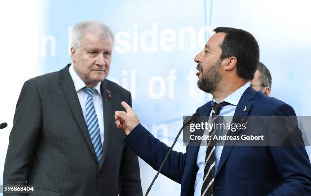 German Interior Minister Horst Seehofer and Italian Interior Minister Matteo Salvini leave a press conference during the European Union member...