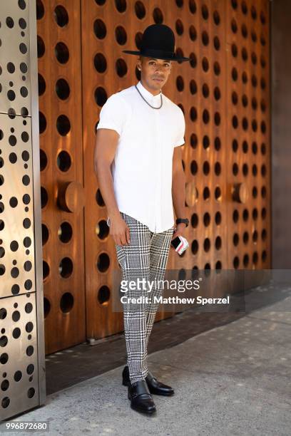 Justiin Davis is seen on the street during Men's New York Fashion Week wearing Zara and Hood by Air on July 11, 2018 in New York City.