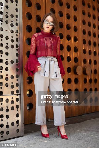 Sonia Em is seen on the street during Men's New York Fashion Week wearing Alex & Olivia on July 11, 2018 in New York City.