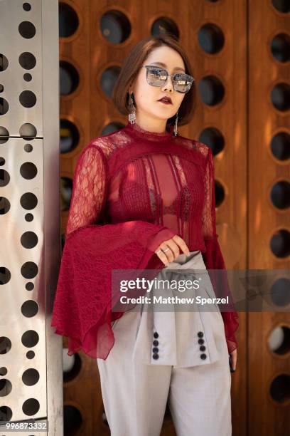 Sonia Em is seen on the street during Men's New York Fashion Week wearing Alex & Olivia on July 11, 2018 in New York City.