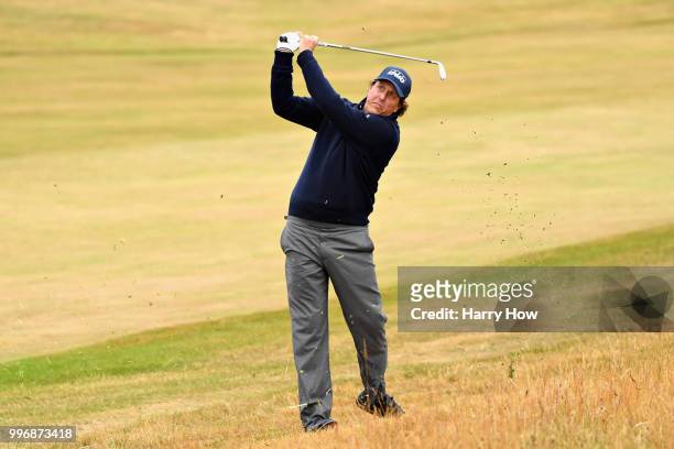 Phil Mickelson of USA takes his second shot on hole one during day one of the Aberdeen Standard Investments Scottish Open at Gullane Golf Course on...