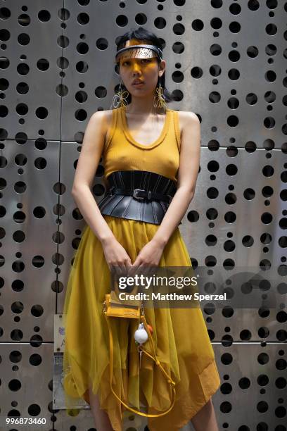 Michelle Song is seen on the street during Men's New York Fashion Week wearing Maison Margiela, Dior, Alexander Wang, JACQUEMUS on July 11, 2018 in...