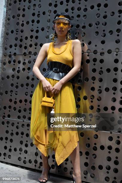 Michelle Song is seen on the street during Men's New York Fashion Week wearing Maison Margiela, Dior, Alexander Wang, JACQUEMUS on July 11, 2018 in...
