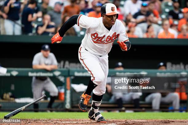 Jonathan Schoop of the Baltimore Orioles doubles against the New York Yankees during the second inning at Oriole Park at Camden Yards on July 11,...