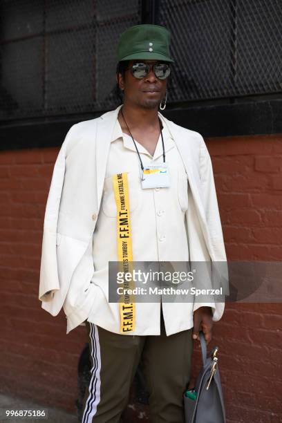 Jonzu is seen on the street during Men's New York Fashion Week wearing Jill Sanders, GCDS, Craig Green sneakers on July 11, 2018 in New York City.