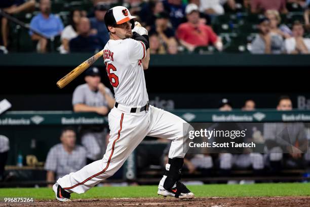 Caleb Joseph of the Baltimore Orioles singles against the New York Yankees during the eighth inning at Oriole Park at Camden Yards on July 11, 2018...