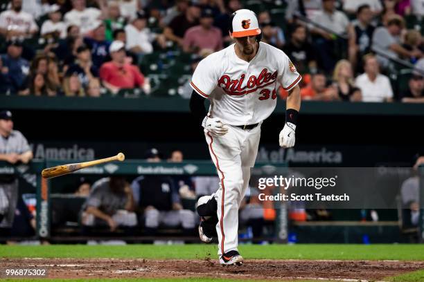 Caleb Joseph of the Baltimore Orioles singles against the New York Yankees during the eighth inning at Oriole Park at Camden Yards on July 11, 2018...
