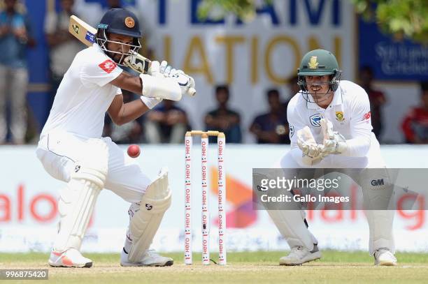 Sri Lanka batsman Dimuth Karunarathne watching the ball closely in his innings during day 1 of the 1st Test match between Sri Lanka and South Africa...