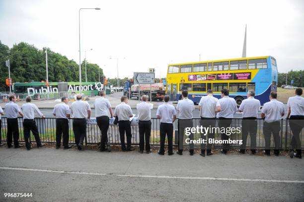 Pilots for Ryanair Holdings Plc and members of Irish Air Line Pilots' Association in Ireland's Forsa union stand on a picket line as they take part...