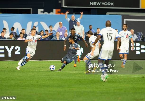 Maximiliano Moralez controls ball during regular MLS game against Montreal Impact on Yankee stadium NYC FC won 3 - 0.