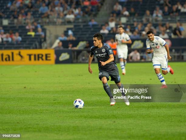 Jesus Medina controls ball during regular MLS game against Montreal Impact on Yankee stadium NYC FC won 3 - 0.