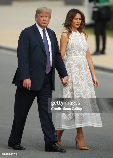 President Donald Trump and U.S. First Lady Melania Trump attend the evening reception and dinner at the 2018 NATO Summit on July 11, 2018 in...