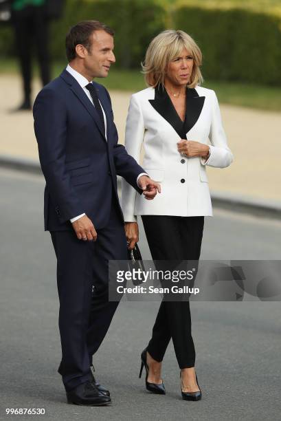 French President Emmanuel Macron and French First Lady Brigitte Macron attend the evening reception and dinner at the 2018 NATO Summit on July 11,...