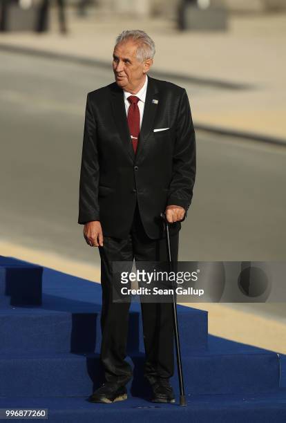 Frail looking Czech President Milos Zeman arrives for a group photo at the evening reception and dinner at the 2018 NATO Summit on July 11, 2018 in...