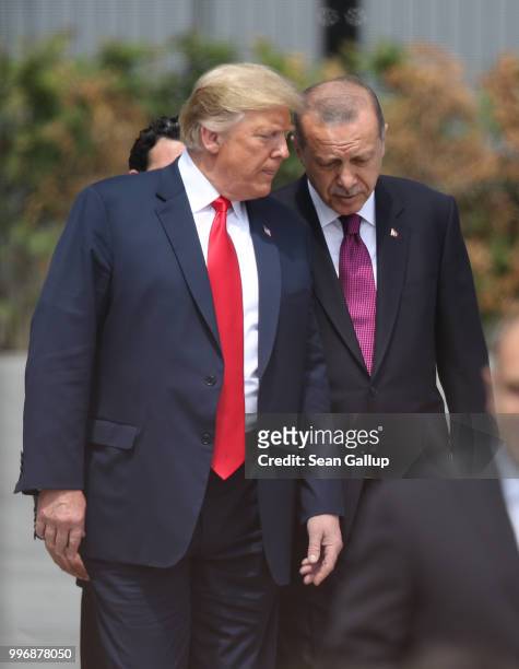 President Donald Trump and Turkish President Recep Tayyip Erdogan attend the opening ceremony at the 2018 NATO Summit at NATO headquarters on July...