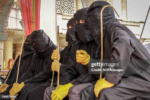 The flogging enforcers from Wilayatul Hisbah. 18 people were convicted by the Meulaboh Sharia Court of different crimes and flogged between 5 times...