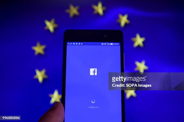 Facebook app with European Union flag are seen in this photo illustration.