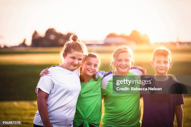 four soccer players after the game - rockford illinois stock pictures, royalty-free photos & images