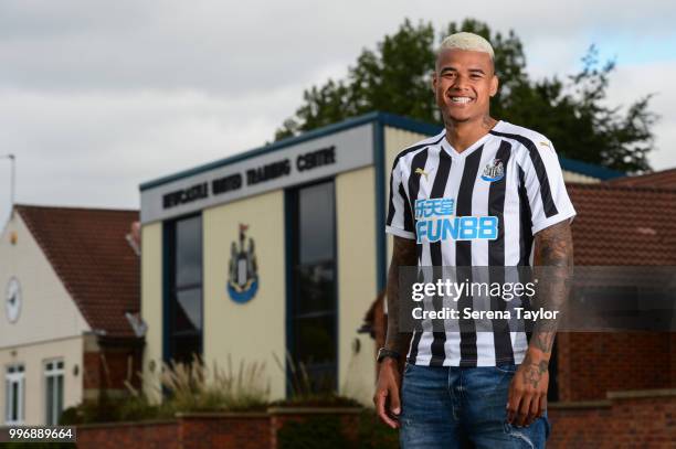 Newcastle's Kenedy poses for photos in the new home kit during a photocall at the Newcastle United Training Centre on July 9 in Newcastle upon Tyne,...