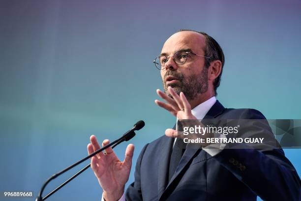 French Prime minister Edouard Philippe addresses the closing speech of the Conference des Territoires meeting in Paris on July 12, 2018 in Paris.